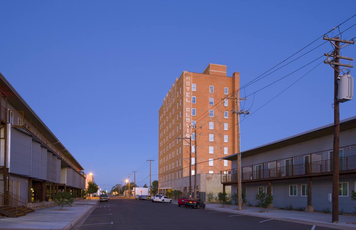 View down Main Street toward the Hotel Clovis tower at dusk in Clovis, New Mexico