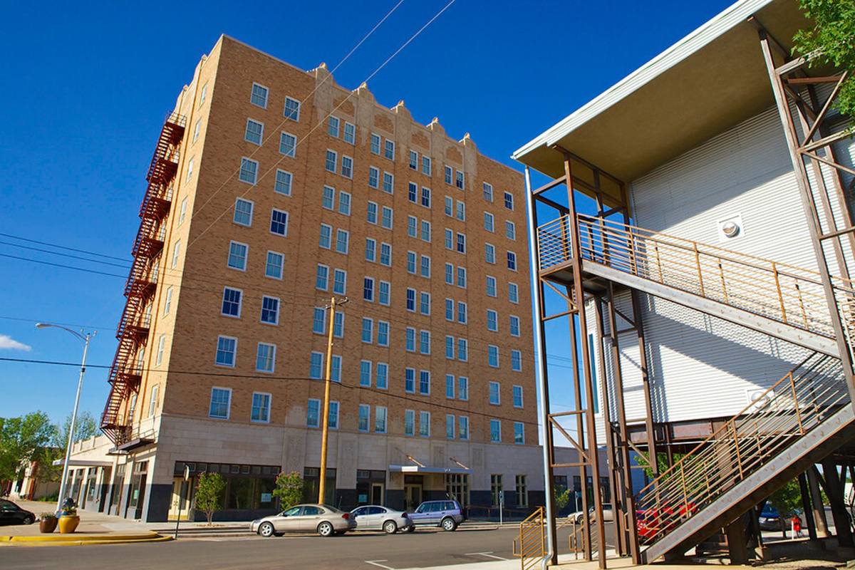 The 1929 tower and the new building together at Hotel Clovis Lofts